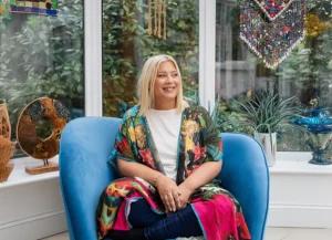 Dr Karen Treisman sitting in a chair